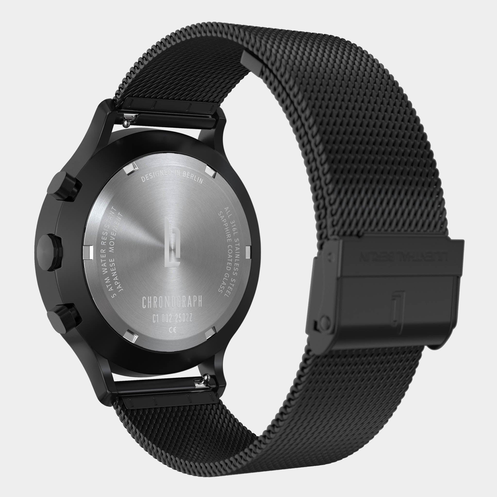 Stainless steel chronograph watch with black mesh strap and engraved case back