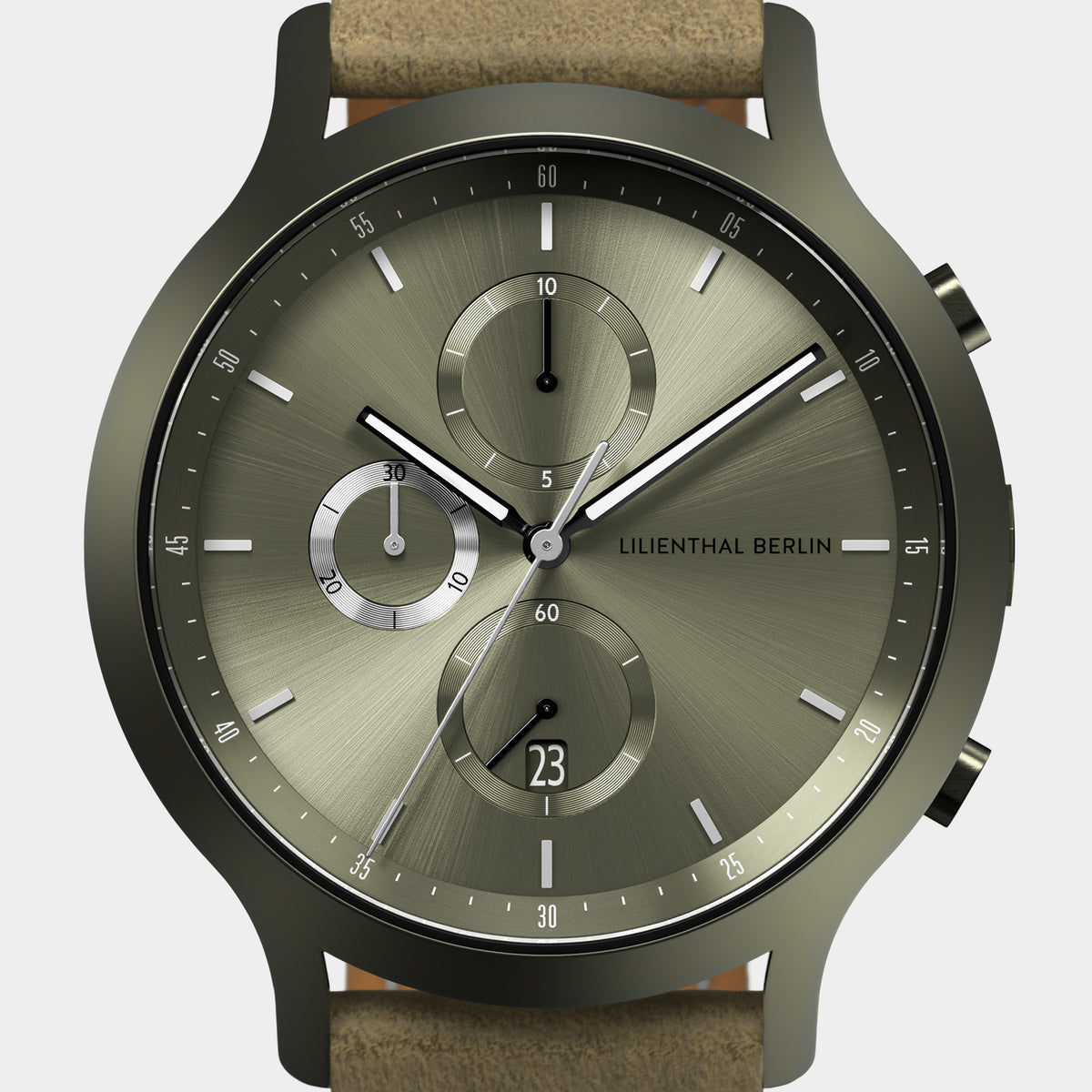 Minimalist olive green chronograph watch with leather strap and subdials, close-up view