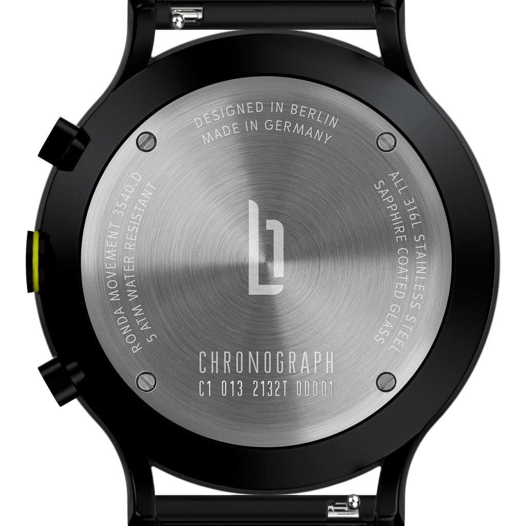 Stainless steel chronograph watch case back with engraved details and logo