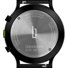 Stainless steel chronograph watch case back with engraved details and logo