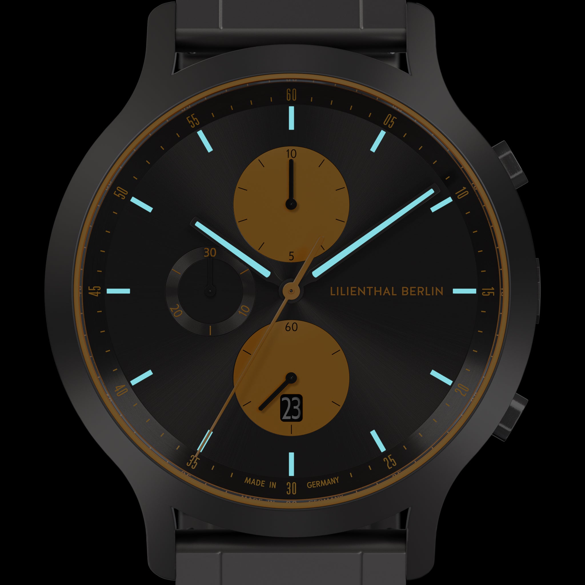 Black and gold chronograph wristwatch with luminous hands and date display