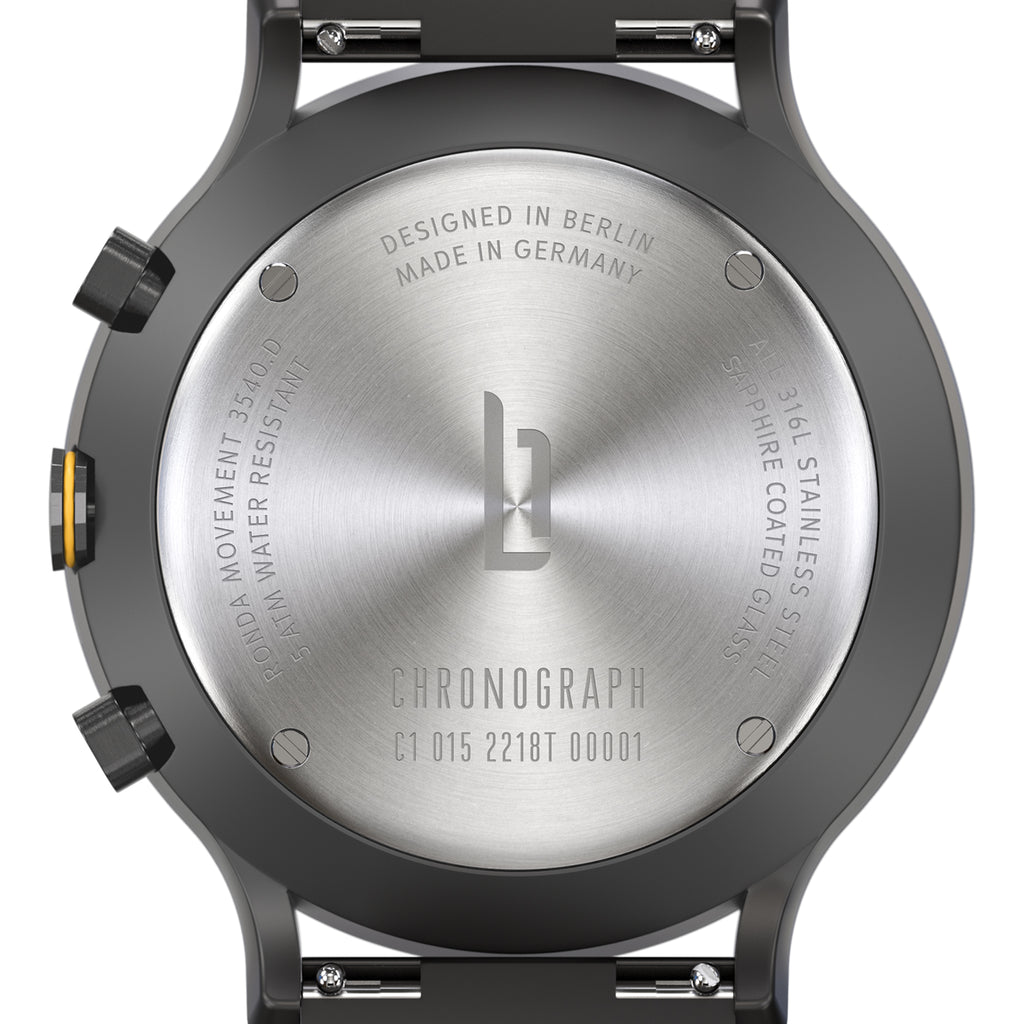 Stainless steel chronograph watch back with engraved Berlin design, sapphire glass, and water resistance details