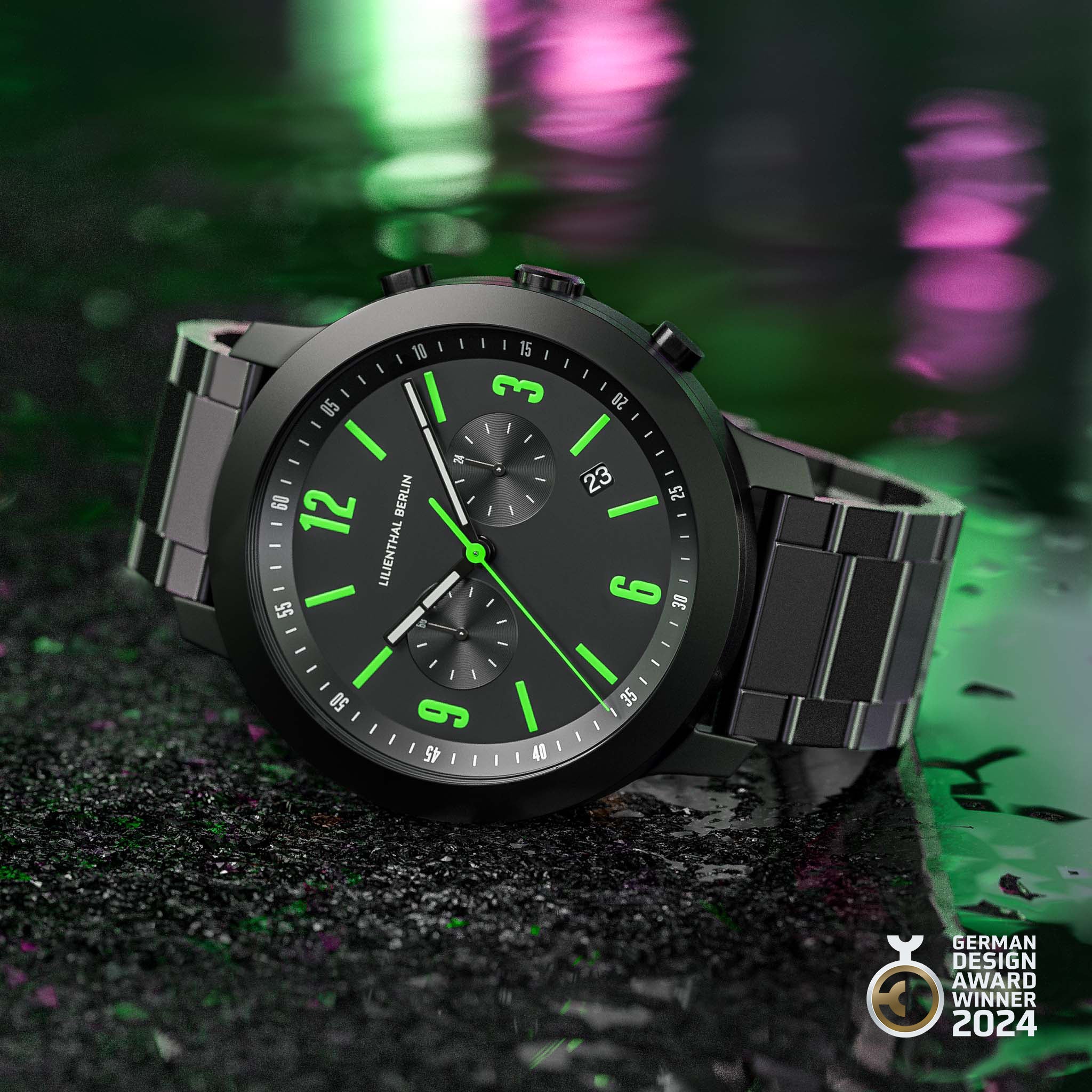 Black chronograph wristwatch with neon green hour markers, metal strap, and award badge.
