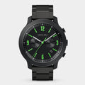 Black chronograph wristwatch with green hour markers and black metal band on white background