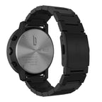 Black stainless steel chronograph watch back, engraved with Chrono Miles text and logo