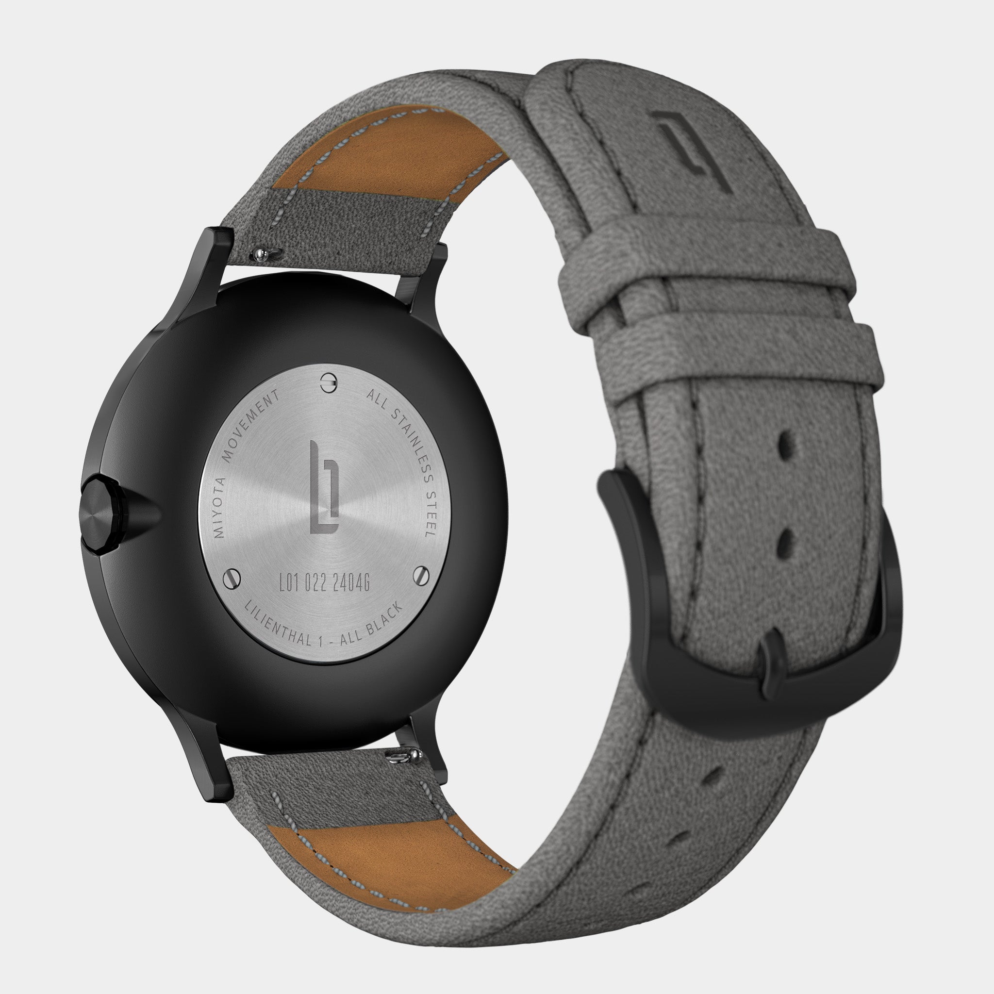 Stainless steel watch case with grey textured leather strap, back view, minimal design