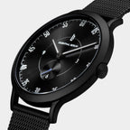Sleek black wristwatch with mesh strap, minimalist dial and white numerals on display